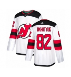 Men's New Jersey Devils #82 Nikita Okhotyuk Authentic White Away Hockey Jersey